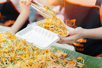 Pad thai noodle or stir-fried rice noodle. Thai cooking. street food Bangkok in Thailand. © Kunlathida