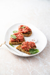 Traditional steak tartare on toast