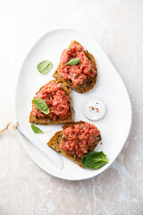 Traditional steak tartare on toast