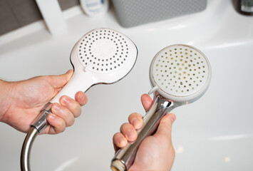 Replacing an old shower head with a new one. Poor water quality and limescale buildup on plumbing...