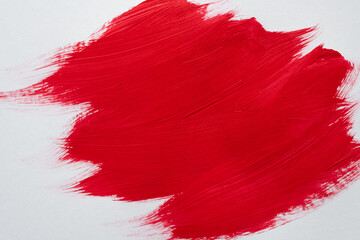 赤色の絵具を塗った背景