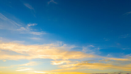 Enjoy a panoramic view of the skyline. The sun rises in the morning sky with colorful clouds. and beautiful cloud patterns In the soft light of the morning	