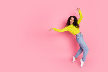 Photo portrait of teenage girl brunette curly hair have fun dancing at discotheque looking back...