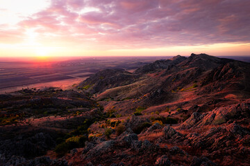 Sunset over the ancient landscape of Macin Mountains