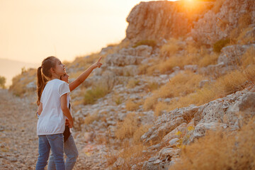 Fototapeta premium Happy Tourists Walking in the Mountains