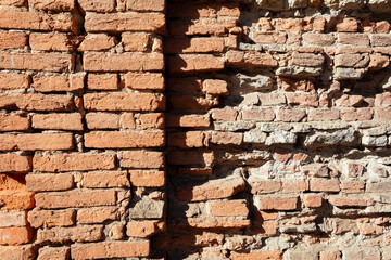 An old brick wall on a city building