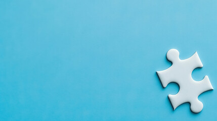 Obraz premium A jigsaw puzzle piece on blue background, representing the white space in business innovation for text or design