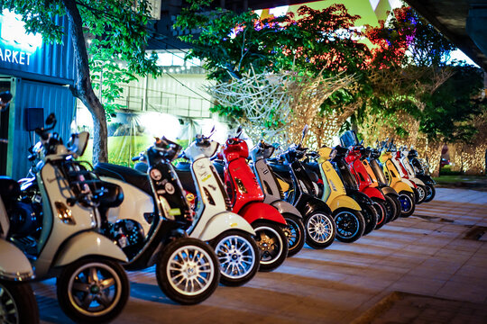 Bangkok, THAILAND - 6 Mar, 2016: In the Night of Rama9 road footpath - Vespa gang were parking in the line for meeting and gethering together., Bangkok, Thailand