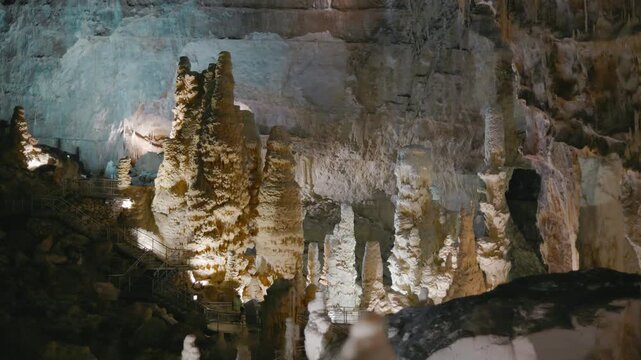 Frasassi Caves, Ancona abyss, the Giants, enormous stalagminths inside an underground cave. Marche, Italy