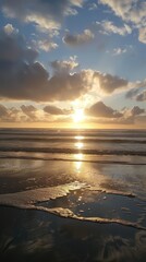 Fototapeta premium Scenic coastal sunset with clouds and reflections.