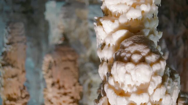Frasassi Caves, stalagmite formation. White calcite rock, geology in Marche, Italy