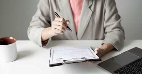 Business woman employer holding resume hiring recruit looking cv resume to hire candidates,...