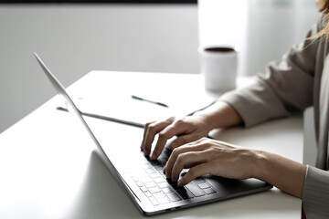 Fototapeta premium Business woman employer holding resume hiring recruit looking cv resume to hire candidates, analyzing information before job interview. Recruitment concepts