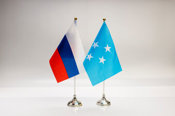 National flags of Russia and Micronesia on a light background. State flags.