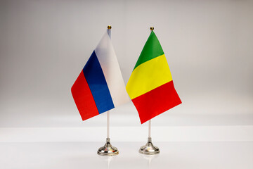 National flags of Russia and Mali on a light background. State flags.