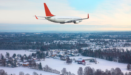 Passenger plane fly up over take-off runway from airport  at Oslo Gardermoen International Airport...