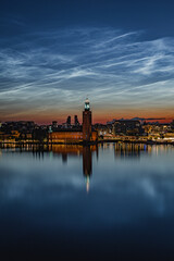 Fototapeta premium Night panorama of Stadshuset in Stockholm with noctilucent clouds