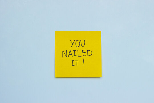 A yellow sticky note that says 'you nailed it!' on light-blue background