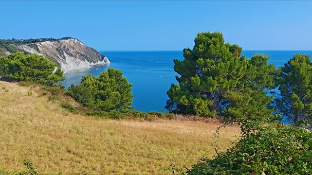 View of the Adriatic coast in the Marche region of Italy. Beach called Mezzavalle near the town of Ancona, Conero park