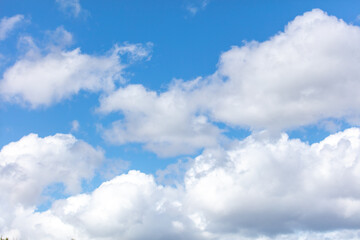 White clouds against a blue sky