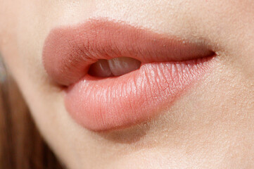 Close-up of lips on a girl's face. Macro