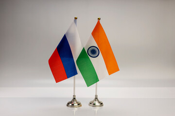 National flags of Russia and India on a light background. State flags.