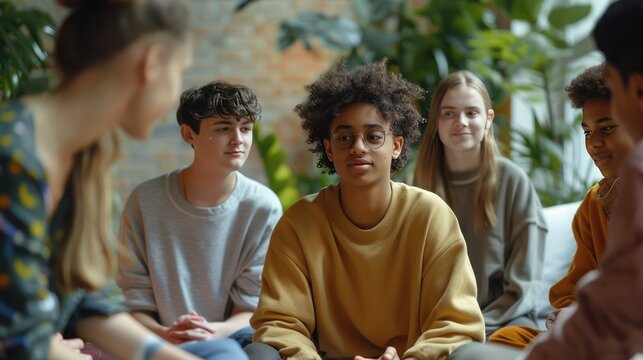 Group of teens participating in a mental health awareness workshop