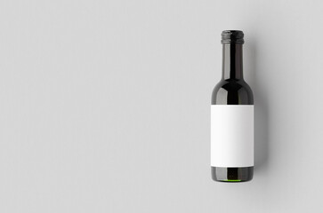 Small red wine bottle mockup. Bordeaux shape. Blank copyspace.