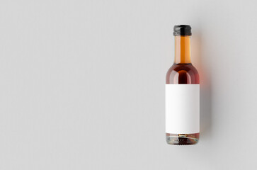 Small rose wine bottle mockup. Bordeaux shape. Blank copyspace.