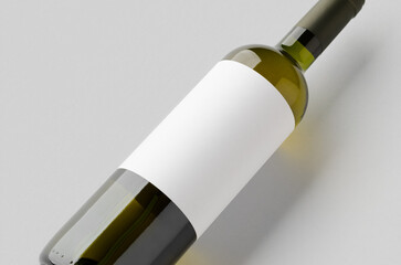 White wine in a green bottle mockup with a blank label. Closeup.