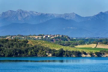 Diana pond and Matra Genoese fortress in eastern plain of Corsica island