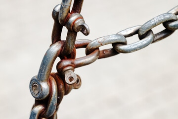 iron rust chain metallic element isolated object with neutral white background closed hard secure concept macro photography