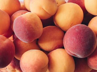 Fresh ripe apricots background. Closeup, top view.