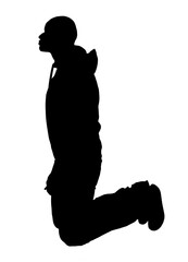 side view of man kneeling on white background