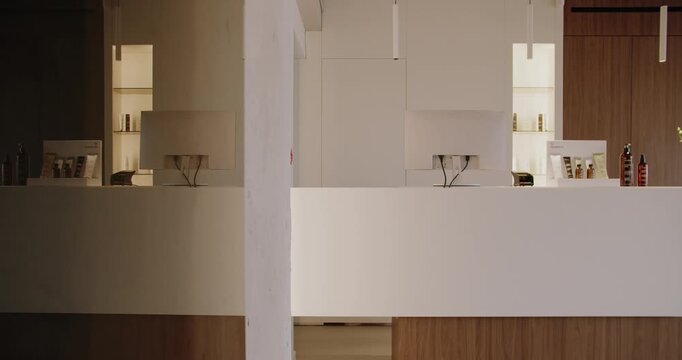 Elegant and minimalistic nail salon interior showcasing clean lines, neutral tones, and a serene atmosphere. Ideal for beauty and wellness spaces. Modern Nail Salon Interior Design, Beauty Spa