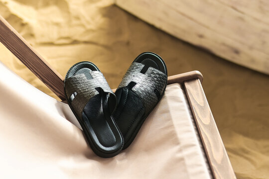 python shoes on the beach