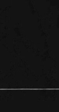 Vertical video old damaged grunge doodle music video effect dust and scratches overlay. High quality 4k footage