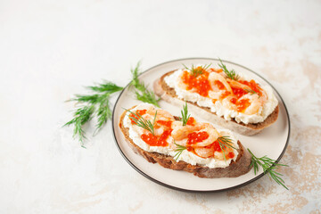 Toast skagen - shrimps and red caviar on bread. Classic swedish sandwich.