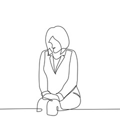 woman in jacket sits huddled - one line art vector. concept female worker before interview, nervousness, anxiety