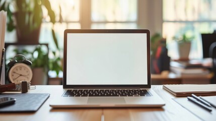 An open laptop on a clean desk