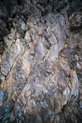 A beautifully textured rock surface set in a stunning natural environment or setting