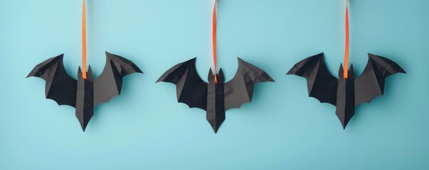 Eerie Bat Shaped Paper Hanging from Ceiling with Deep Depth of Field for Halloween Party or Autumn