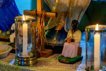 Altar with religious symbols honoring the entities and deities present in Umbanda and Candomble in Brazil © Fred Pinheiro