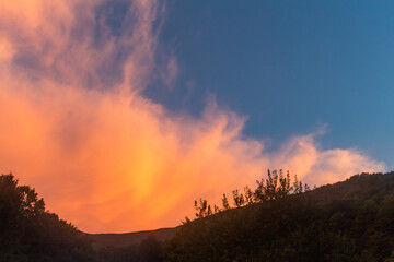 pink clouds over the mountains..