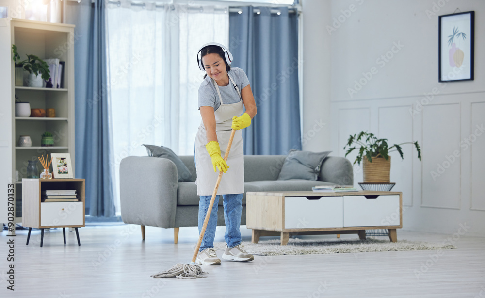 Poster Service, mopping and woman with headphones in living room for cleaning, remove dirt or disinfection. Floor, gloves and hispanic maid with apron for listening to music, podcast or hygiene in home