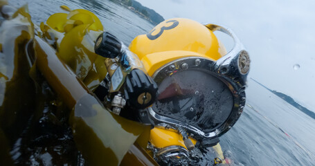 Closeup of commercial diver in helmet