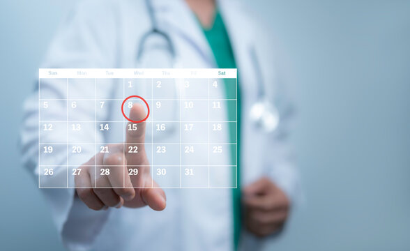 Medical worker touch virtual digital calendar  for plan treatment patient and follow up in hospital. Calendar agenda appointment meeting schedule concept.Planning Organizer, Time management.