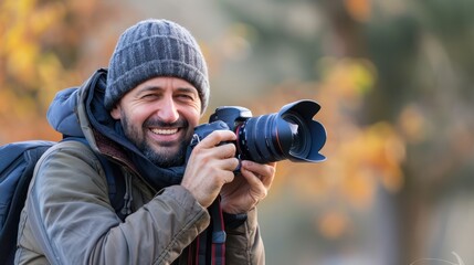 Happy photographer with his camera,Confident and happy smiling man.