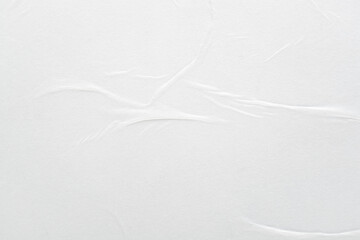 Abstract background of white paper with folds.