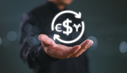 Global currency exchange, forex business technology. Money transfer international bank concept. Businessman hold global with currency icon (dollar, euro, pound, yuan and yen). Digital finance rate